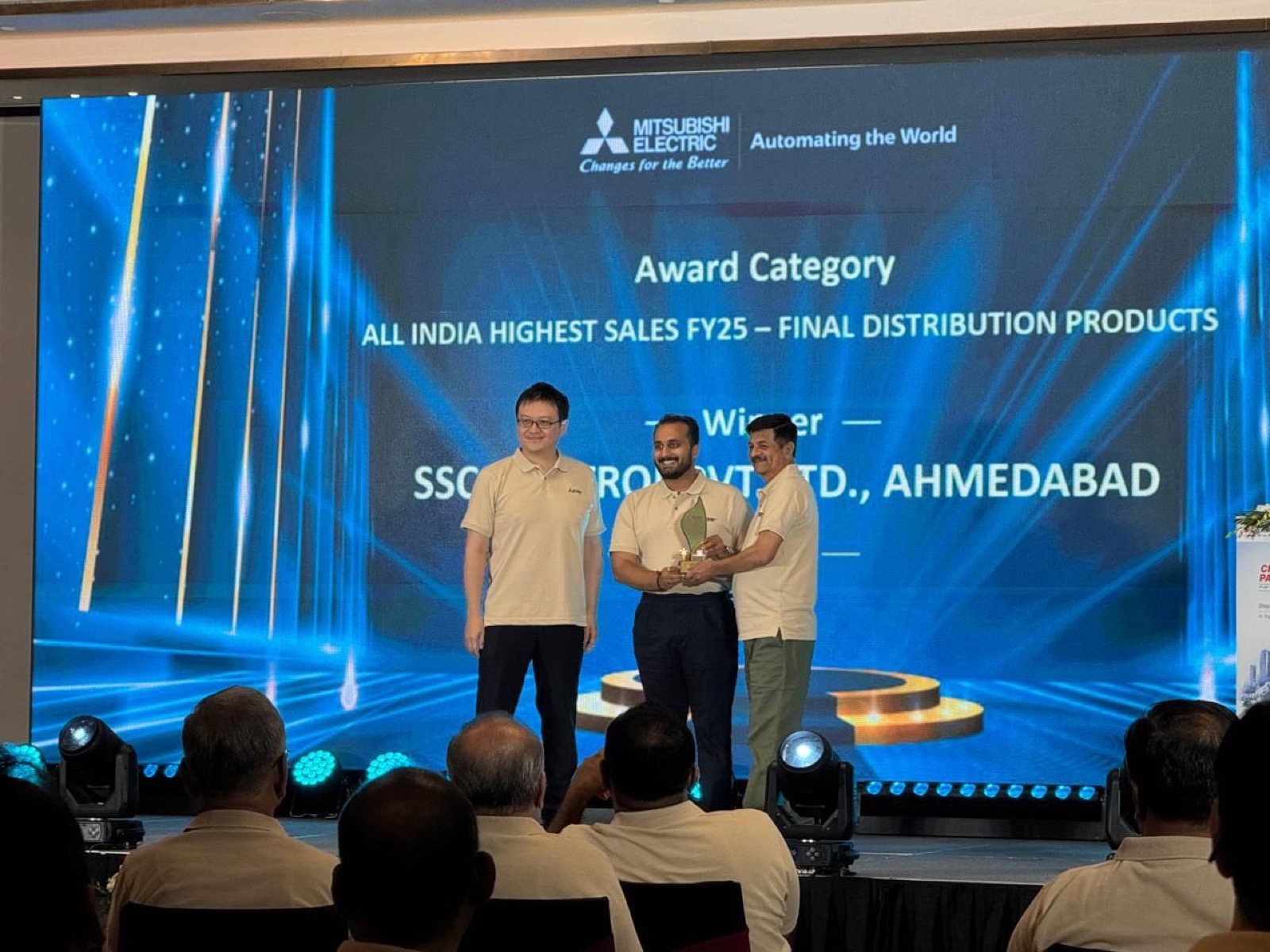 SSC Control receiving the All India Highest Sales FY25 award at the Mitsubishi Electric Annual Channel Meet 2026 in Vietnam